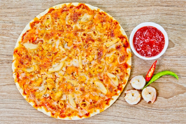 Classic Seafood Pizza with spicy chilli sauce