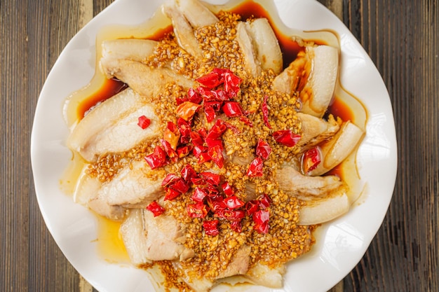 Photo classic sichuan cuisine white pork with garlic