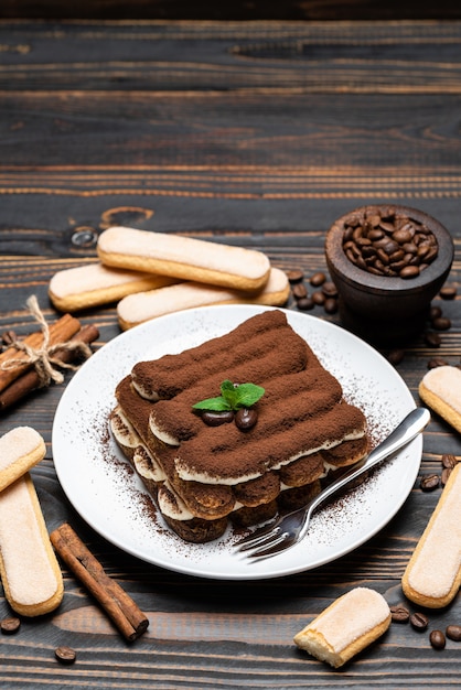 Classic tiramisu dessert on a ceramic plate