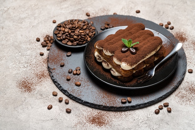 Classic tiramisu dessert on a ceramic plate