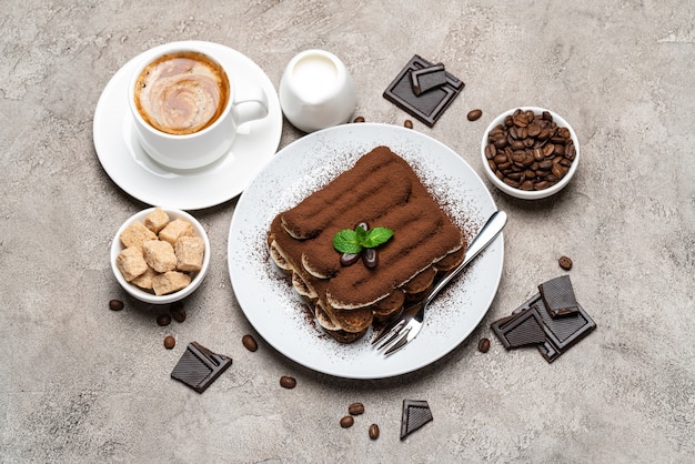 Classic tiramisu dessert on a ceramic plate