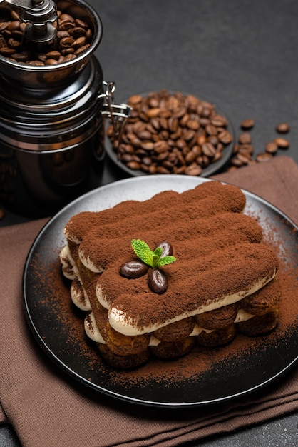 Classic tiramisu dessert on a ceramic plate