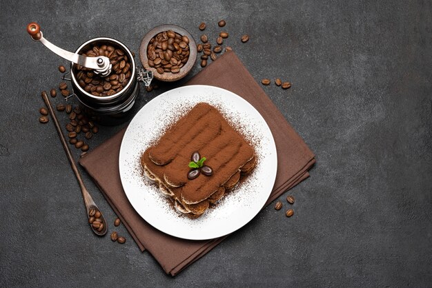 Classic tiramisu dessert on a ceramic plate