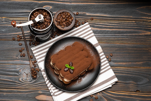 Classic tiramisu dessert on a ceramic plate