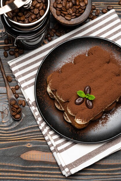 Classic tiramisu dessert on a ceramic plate