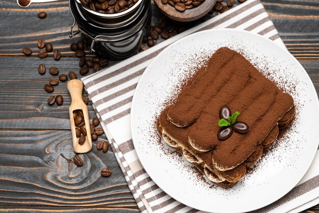 Classic tiramisu dessert on a ceramic plate