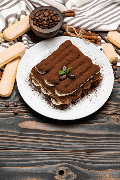 Classic tiramisu dessert on a ceramic plate