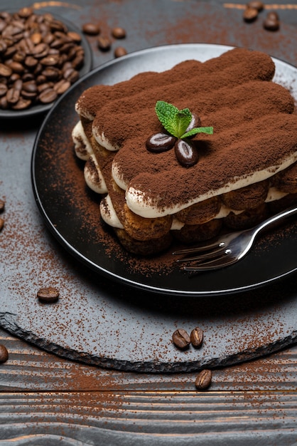 Classic tiramisu dessert on a ceramic plate