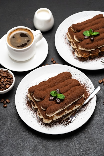 Classic tiramisu dessert on concrete background