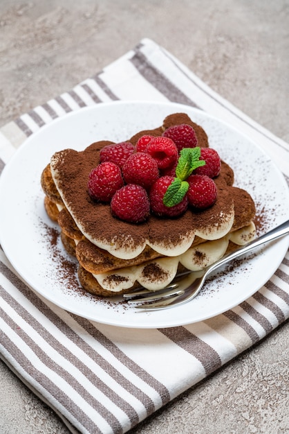 Classic tiramisu dessert with berries