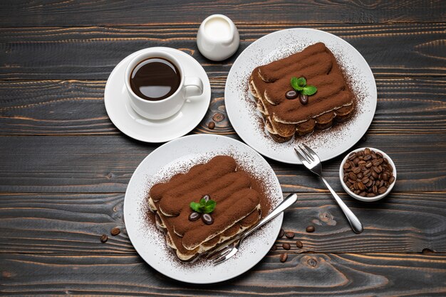 Classic tiramisu dessert on wooden background