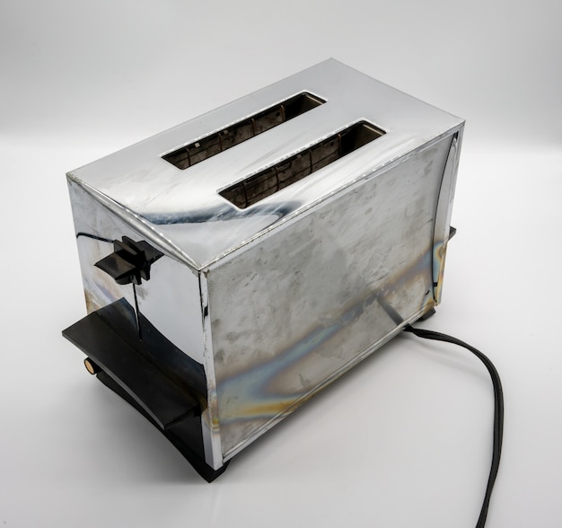Photo classic vintage chrome toaster isolated on white