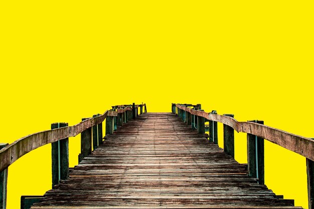 Classic wooden bridge on colored background with clipping path