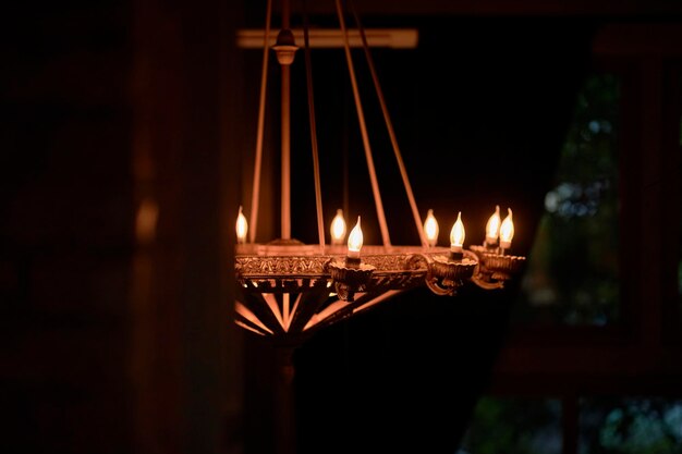 classical antique chandelier on room. classical old antique chandelier, old chandelier. soft focus