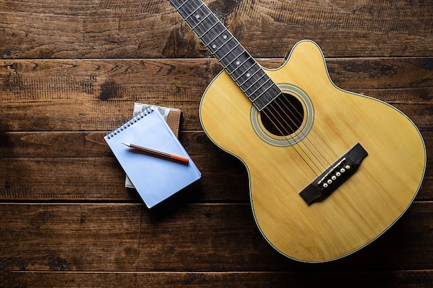 Classical guitar on wooden