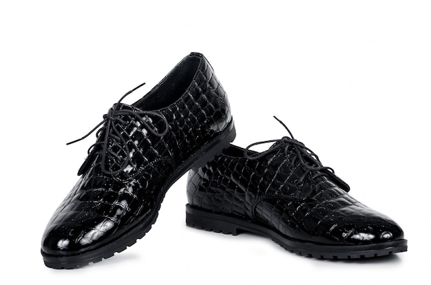 Photo classical pair of patent black male shoes