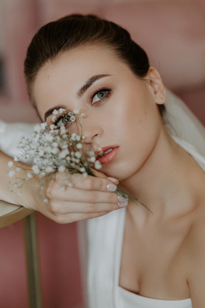 Classical young gourgeous bride. Studio interior fashion shot of fashion model in wedding dress