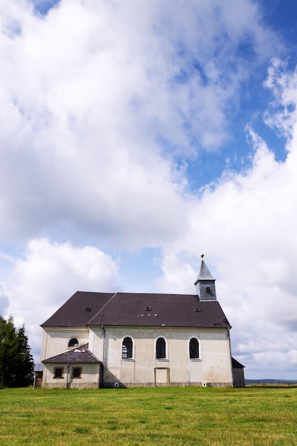 Photo classicist church of holy trinity from 1783 in maly haj hora svate kateriny town