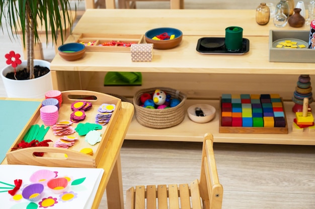 Classroom of montessori kindergarten the colorful montessori material concept of children learning t