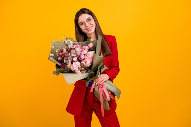 classy attractive business lady hold big flowers bunch