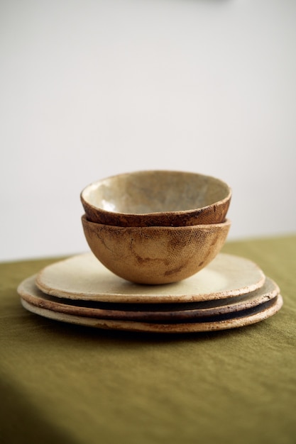 Clay dinnerware set handmade using natural materials for the home