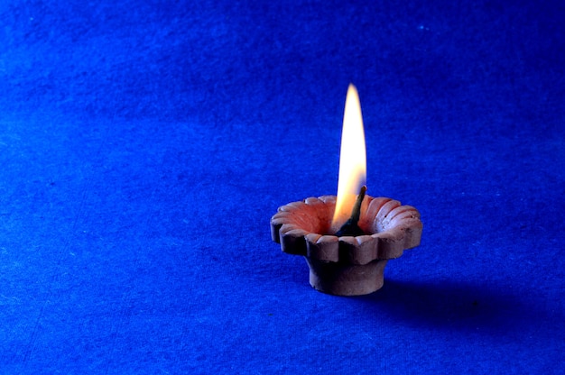 Clay diya lamps lit during diwali celebration. Greetings Card Design Indian Hindu Light Festival called Diwali