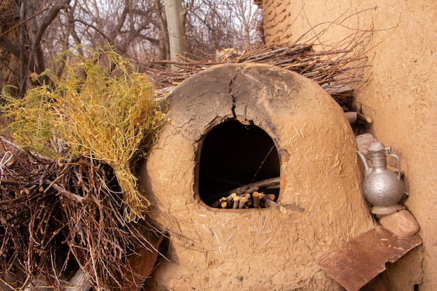 The clay oven for baking bread with firewood