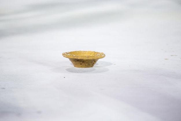 Clay plate on a white floor during an event in Rio de Janeiro