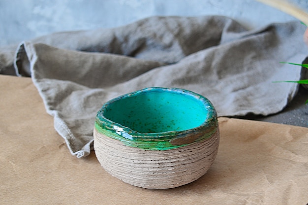 Clay plates, handmade bowls in wabi sabi style.