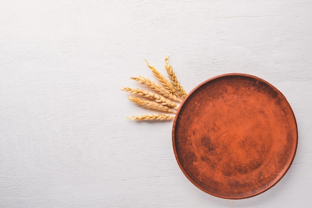 Clay pot Dishes On a wooden background Top view Free space