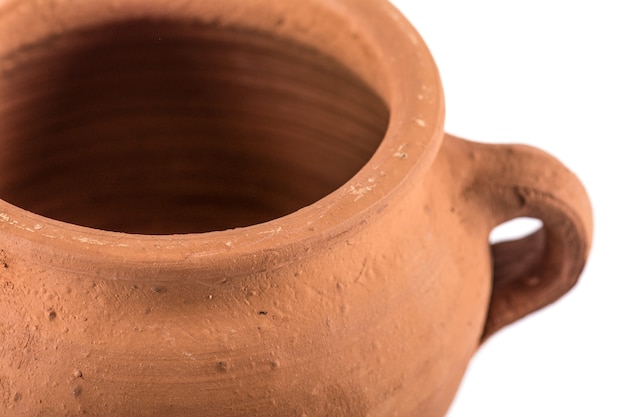 Clay pot on white background