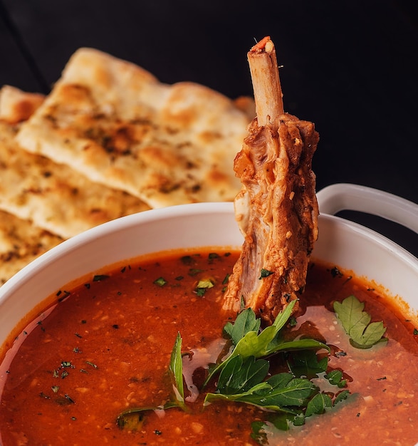 Claypot of spare rib soup on white bowl