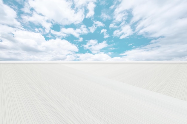 Clean and bright unmanned striped ground square with cloudy sky