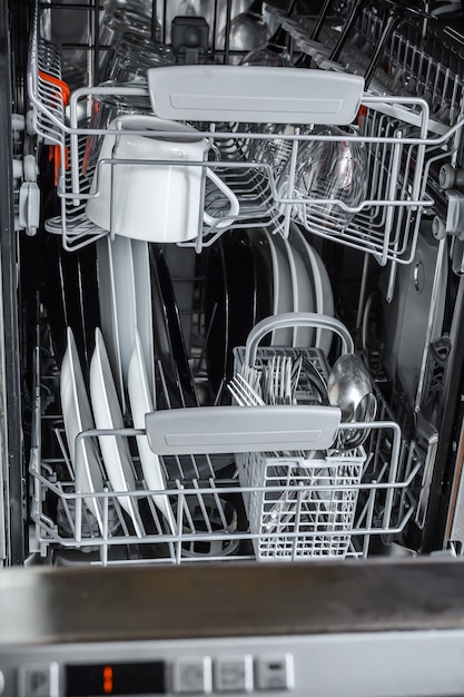 Clean dishes after washing in the dishwasher machine
