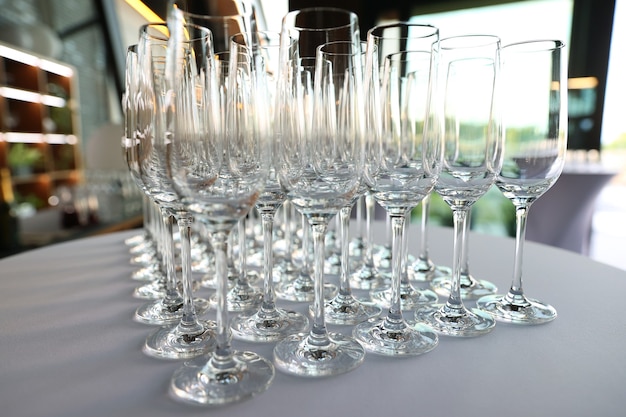 Clean empty glasses are on the table in the restaurant