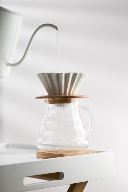 Clean the filter paper before drip coffee