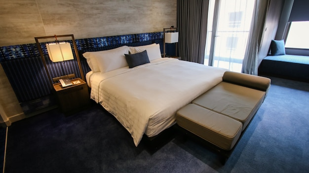 Clean hotel room with wooden bunk beds