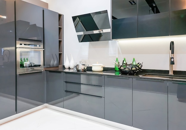 clean kitchen interior with stainless steel appliances in a luxury apartme