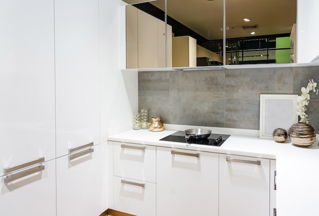 clean kitchen interior with stainless steel appliances 