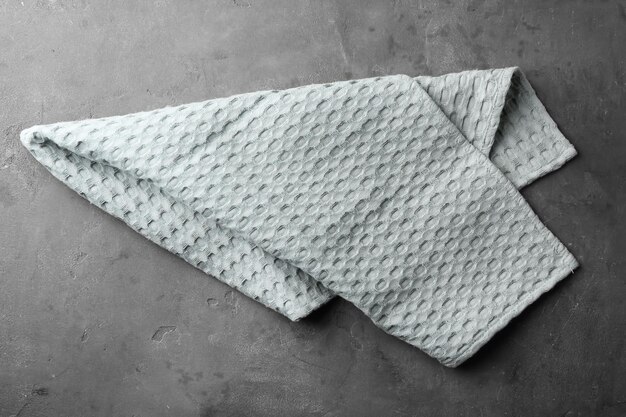 Clean kitchen towel on grey background