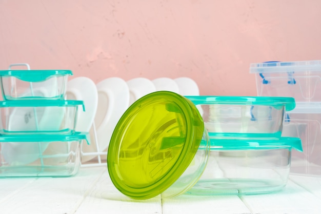 Clean kitchen with various plates and food boxes