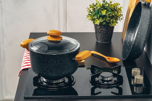 Clean saucepan on a gas stove in kitchen