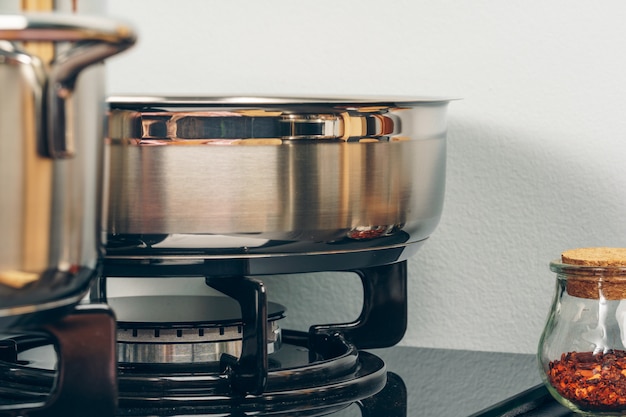 Clean saucepan on a gas stove in kitchen