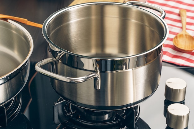 Clean saucepan on a gas stove in kitchen