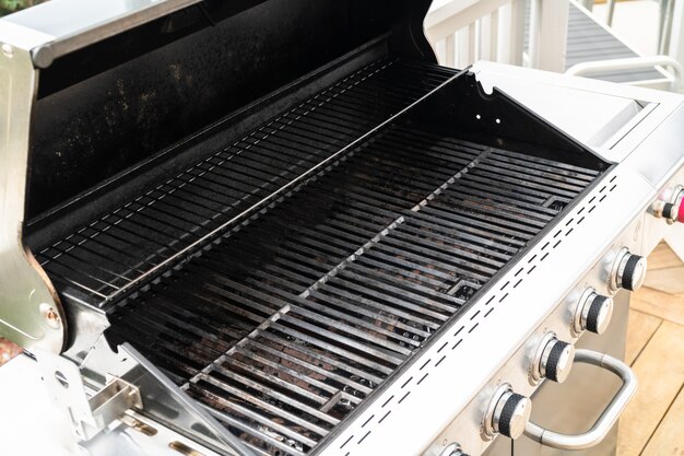 Clean six-burner gas grill ready for summer grilling.