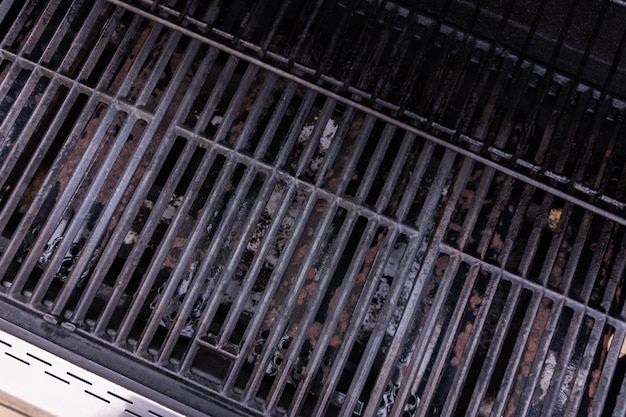 Clean six-burner gas grill ready for summer grilling.