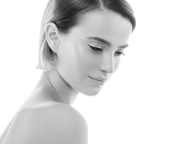 Clean skin woman natural makeup beauty healthyskin isolated on white. Studio shot.  Monochrome. Gray. Black and white.