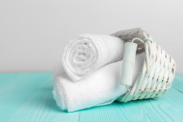 Clean soft towels on wooden table