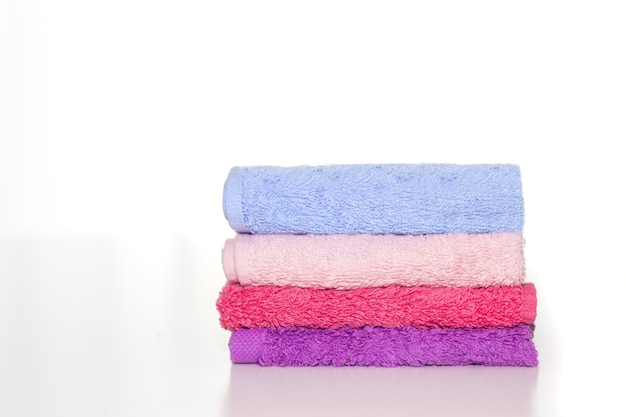 Clean towel set on a white surface