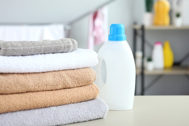 Premium Photo | Clean towels and laundry detergents in the laundry room